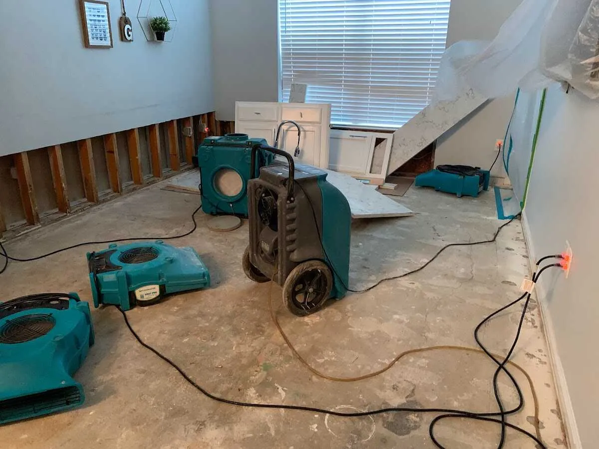 Dehumidifier in flood-cut room for Water Damage Restoration in Palm Desert
